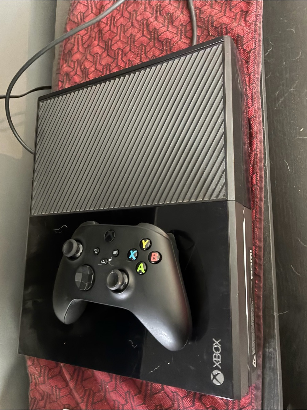 One Xbox One Console with Black Wireless Controller - Black